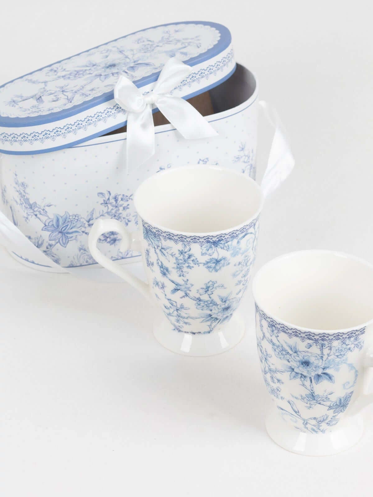 Blue floral patterned mugs with a matching gift box.