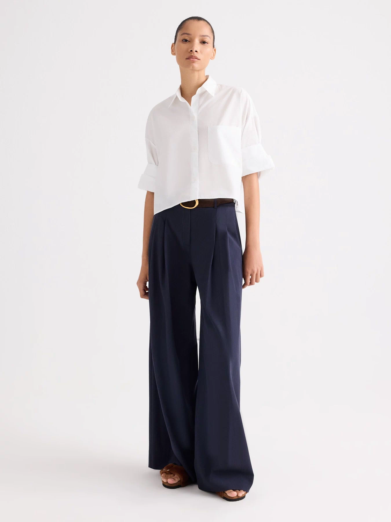 White Cropped Button Down Next Ex Shirt Styled with Navy Wide Leg Pants - Full Length View | TWP Clothing