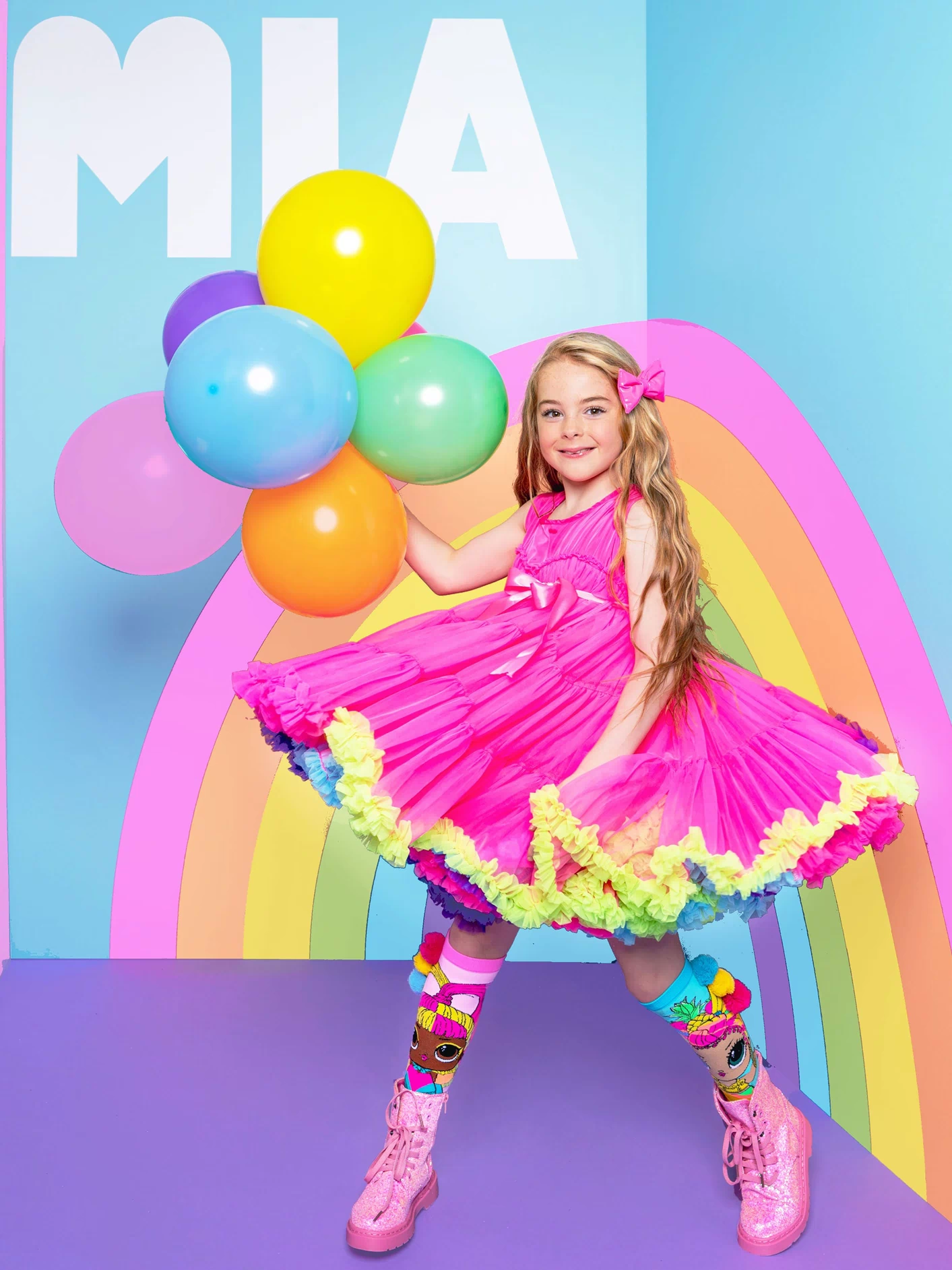Colorful pink MADMIA Wonderland Dress with fluffy tulle and whimsical styling, perfect for birthdays and special occasions.