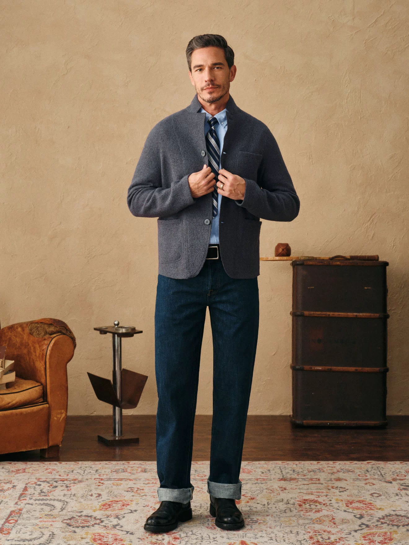 Gray felted wool chore coat button-front worn with dark trousers