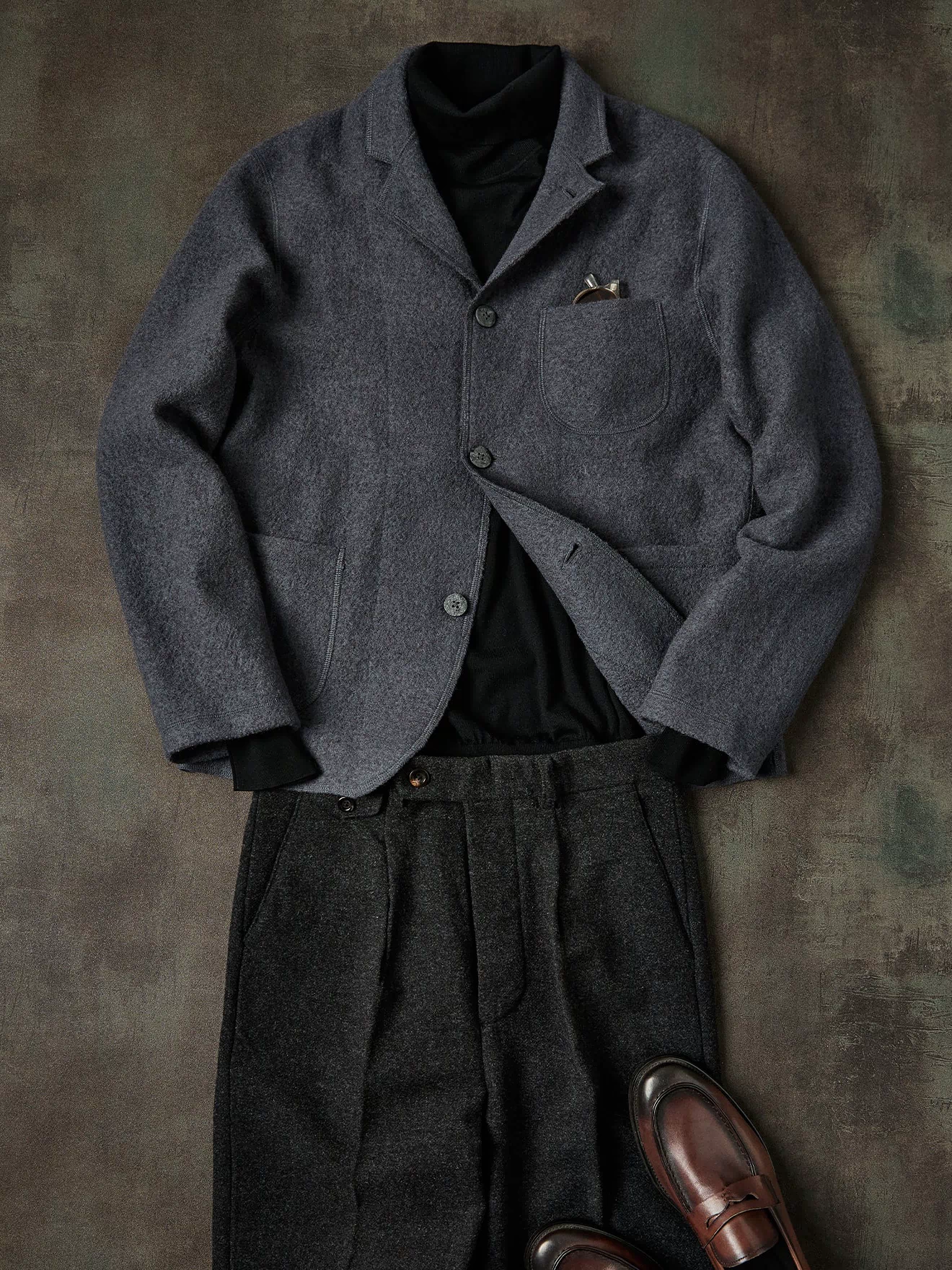 Gray felted wool chore coat with button front and flap pockets