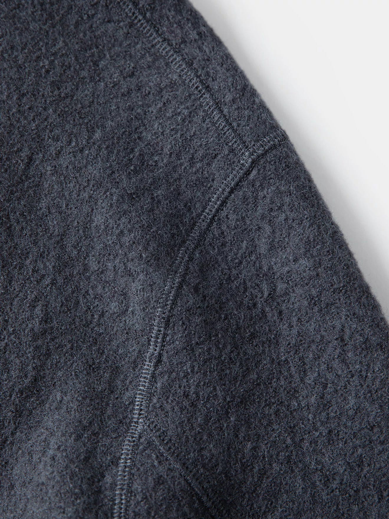 Gray felted wool chore coat sleeve seam detail