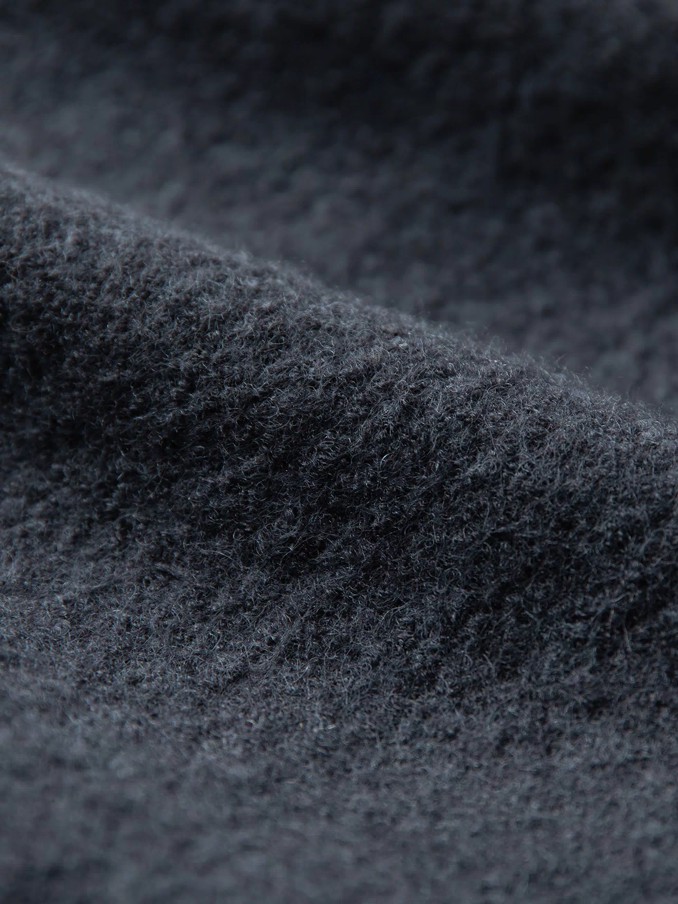 Gray felted wool chore coat wool felt texture close-up
